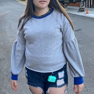 POP SUGAR’s grey long sleeve shirt